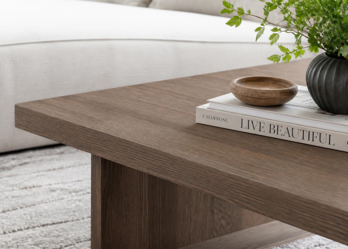 Low coffee table with a wood-grain laminate top